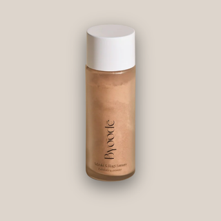 Limpiador exfoliante en polvo a espuma con exfoliantes físicos y químicos.
